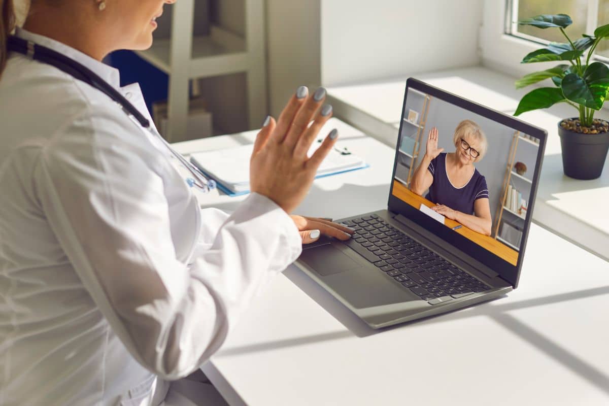 Telehealth appointment Patient engaging in a telehealth consultation from home, showcasing modern healthcare accessibility