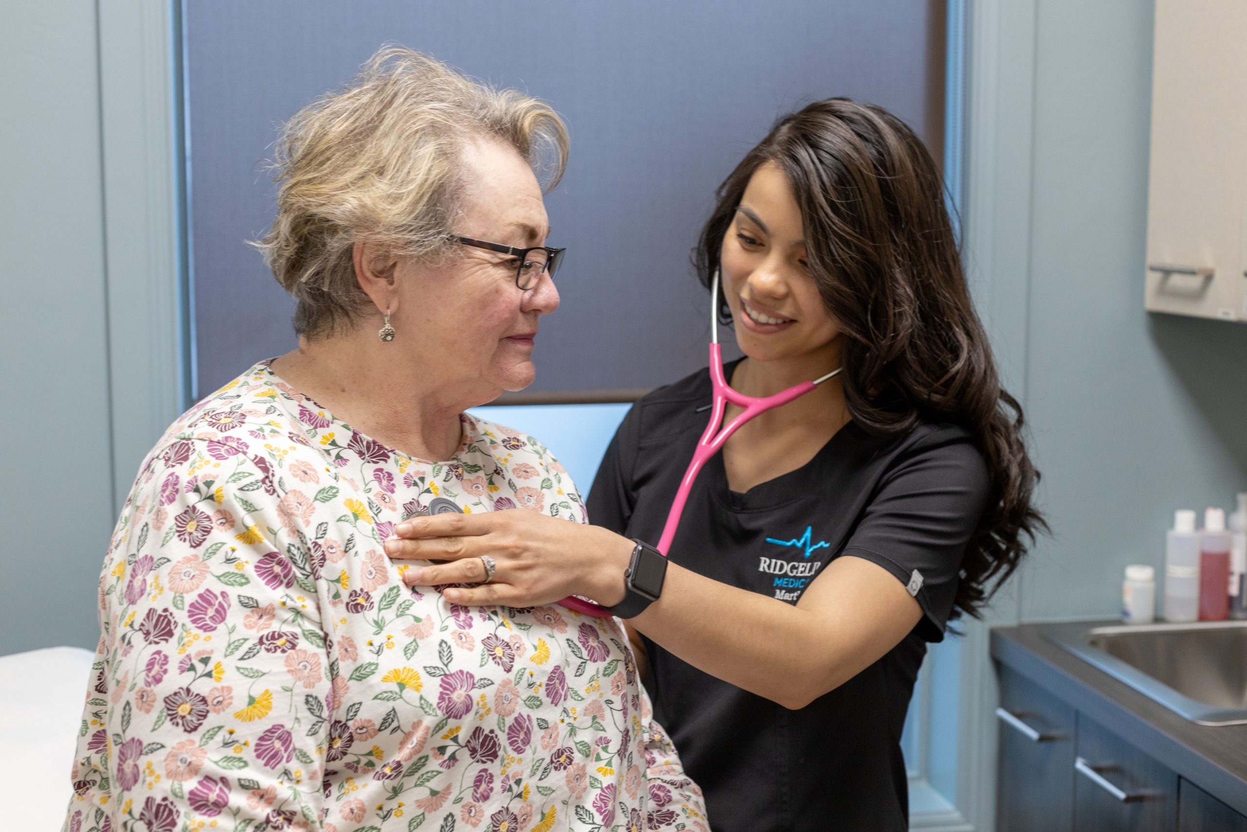 Helen Kenney PA-C using stethoscope at Ridgeline Medical in Idaho Falls, ID